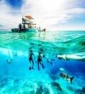 caribbean dive boat with underwater divers tropical