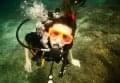girl close up scuba diving