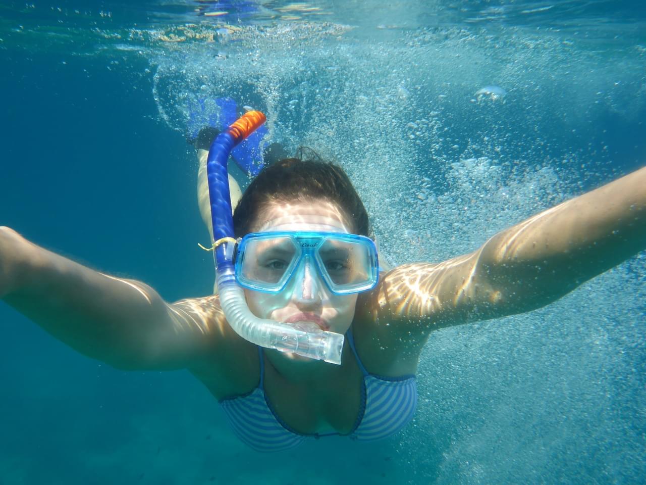 Girl snorkeling underwater