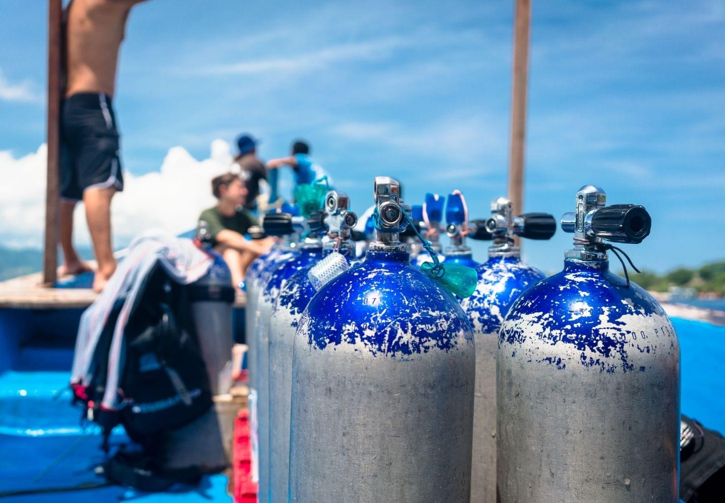 scuba diving air tanks on boat